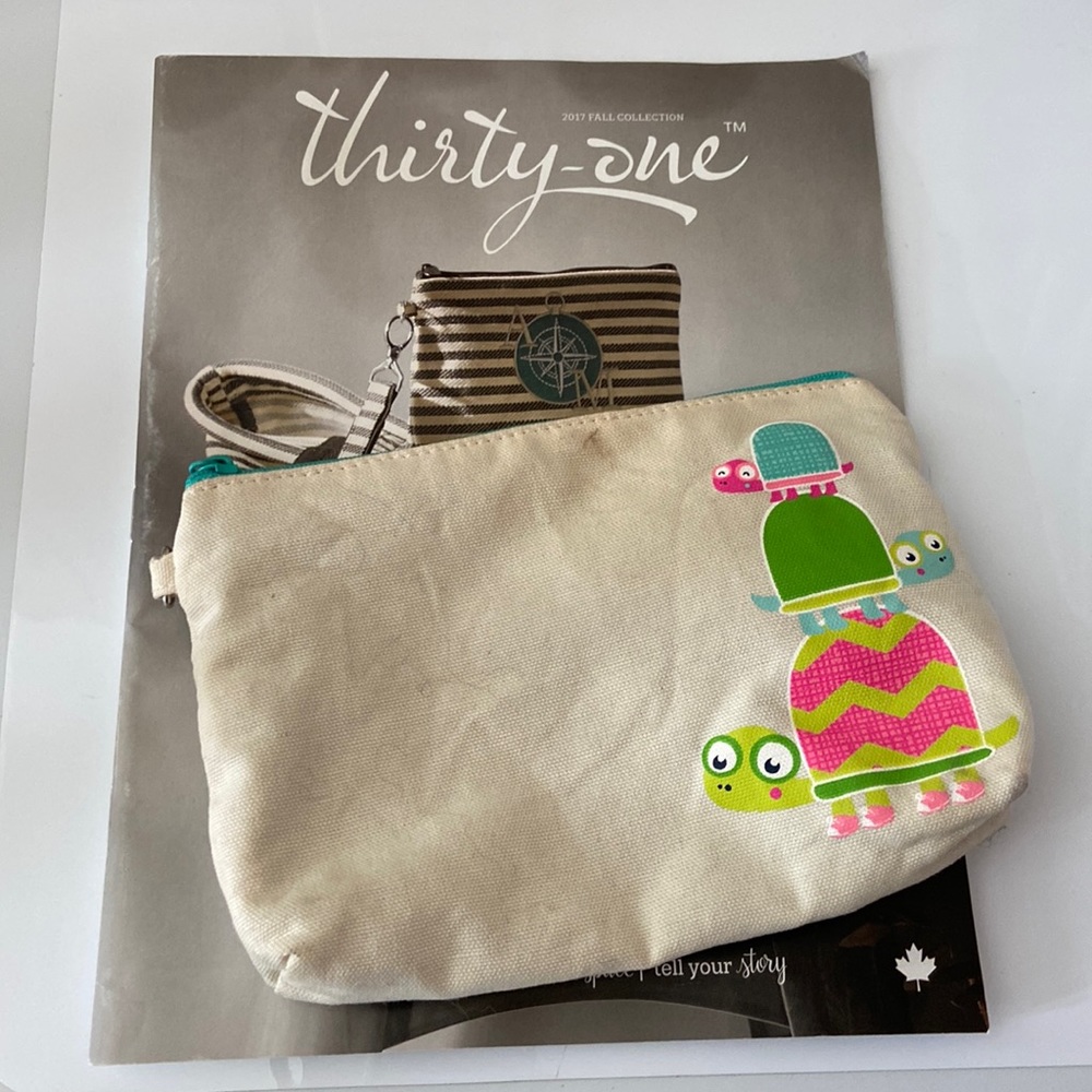 Thirty-one 2017 fall collection catalogue and mini makeup pouch.